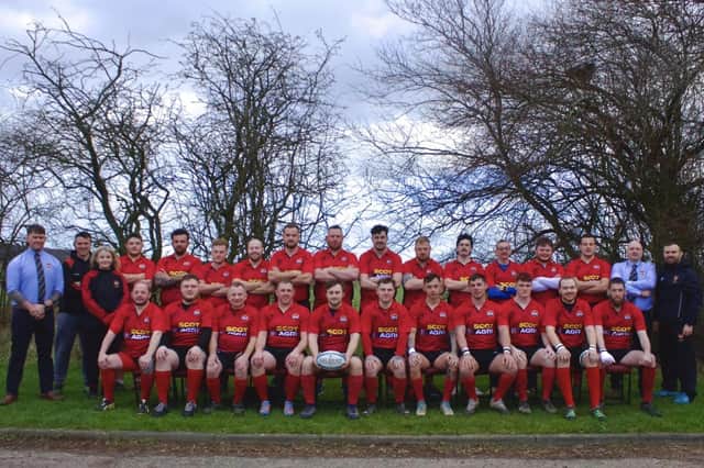 Glenrothes Rugby Club squad in their new jerseys from sponsors Scot Agri, whose representative Dave Bousie is pictured second from the right in the back row (Submitted pic)