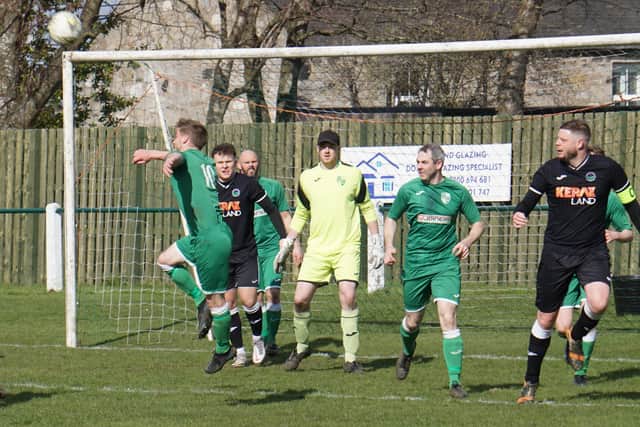 Thornton Hibs clear their lines during the weekend's game. Pic by John Laing