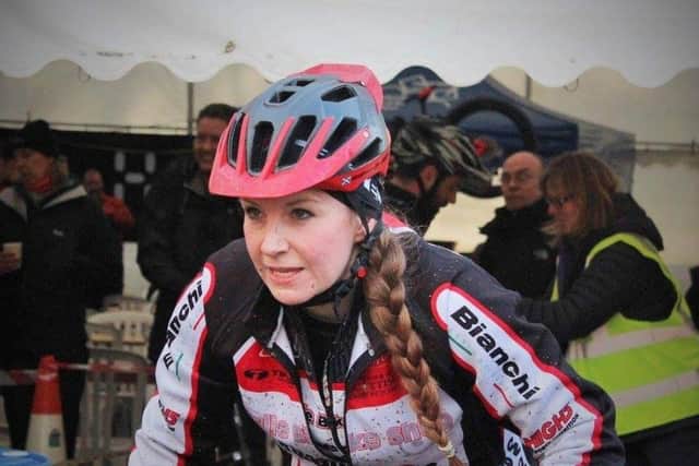 Gillian competing at a mountain bike event.