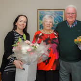 Charlie and Sheila Oliver were presented with flowers by Councillor Kathleen Leslie and Deputy Lieutenant Clare Mitchell (Pic: Andrew Beveridge)