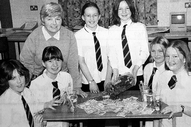First year pupils at Kirkcaldy High School raised money for Children In Need  in 1999 after learning that Thomas Cook accepted foreign currency for the charity. Pictured with teacher Elsie Samuel are (l to r) Rachel Cooper, Ashley Greenlaw, Kylie Robertson, Danielle Craig, Samantha Gourlay and Kelly Horsburgh. 