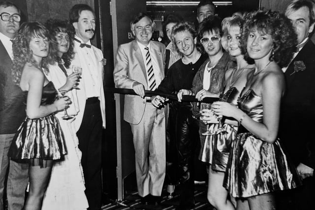 The December 1985 opening of Oasis nightclub in Glenrothes. Pictured doing the honours is businessman, Eddie Melville, who had a string of clubs and pubs across Fife and central Scotland. To his right is the familiar face of Colin Routh from chart toppers, Black Lace. The picture first appeared in the Glenrothes Gazette.