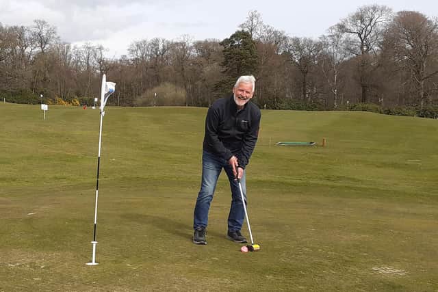 Club chairman, Martin Christie, has a go at Park Gowf.