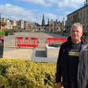 David Torrance MSP with the charred remains of Kitty's in the background (Pic: Submitted)