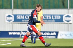 Ethan Ross in action for Falkirk against Queen of the South (Photo: Michael Gillen)