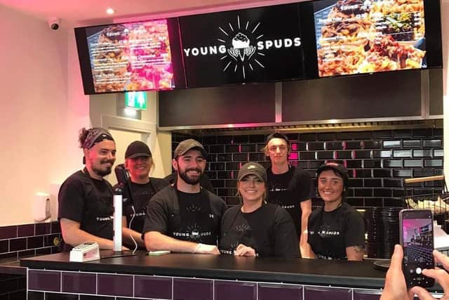 Conor and Hannah with the staff inside Young Spuds which opened in Kirkcaldy at the weekend.