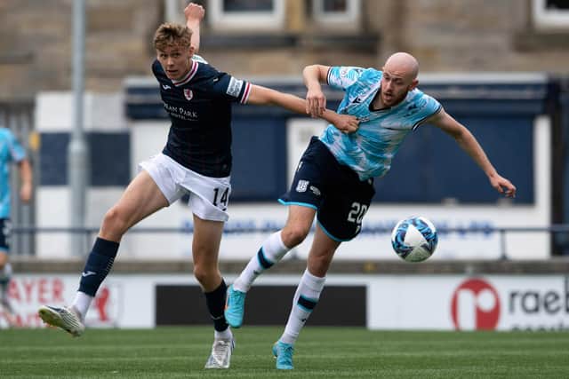 Raith Rovers' Connor O'Riordan getting to grips with Dundee's Zak Rudden suring their sides' Scottish Championship match at Stark's Park in Kirkcaldy on Saturday (Photo by Paul Devlin/SNS Group)