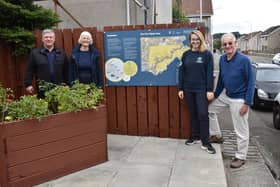 The unveiling of the new interpretation panel in Cardenden, from left to right, David Doig, chairman of Cardenden History Group, Rosemary Wallace, secretary of CCDF, Alexandra Hoadley, conservation officer of FCCT, and David Taylor, chairman of CCDF.