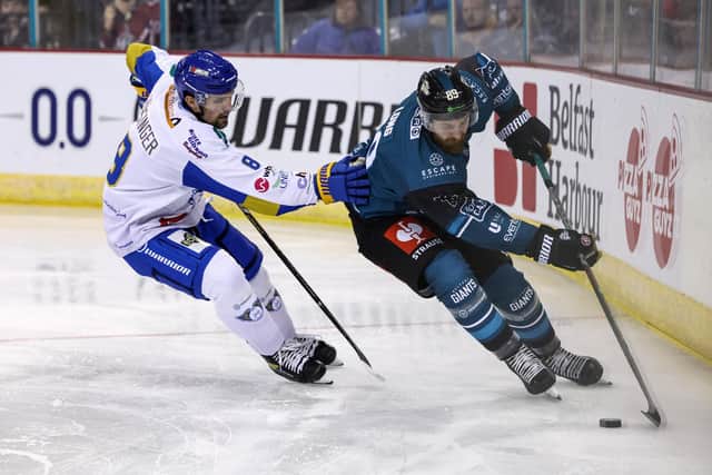 Belfast Giants’ Ciaran Long with Fife Flyers’ Christian Hausinger  (Pic: William Cherry/Presseye)