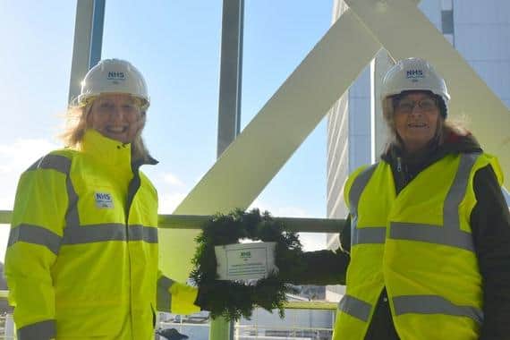 At the topping out ceremony are Carol Potter, NHS Fife chief executive, and Tricia Marwick, board chair.