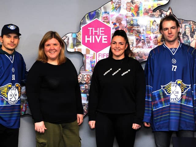 Launching Fife Flyers Pride jerseys are players  Troy Lajeunesse and Kevin Lindskoug, with Lindsey Williamson, director at the Hive LGBT Hub with Jenna Sexton (Pic: Fife Photo Agency)