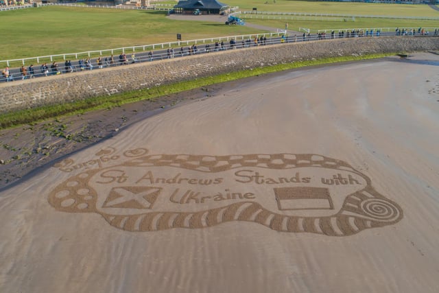 This impressive piece of beach art at the West Sands clearly demonstrated the support of the St Andrews community for the people of Ukraine and was much admired by gathering protesters.