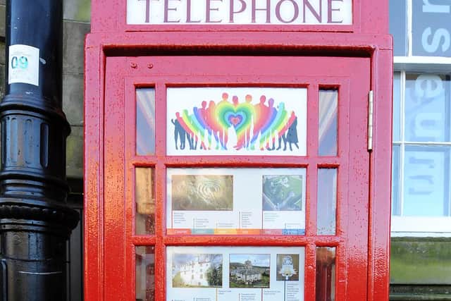 The old red telephone kiosk in Burntisland High Street has been given a makeover and features a timeline and  information about the town's history. Pic: Fife Photo Agency