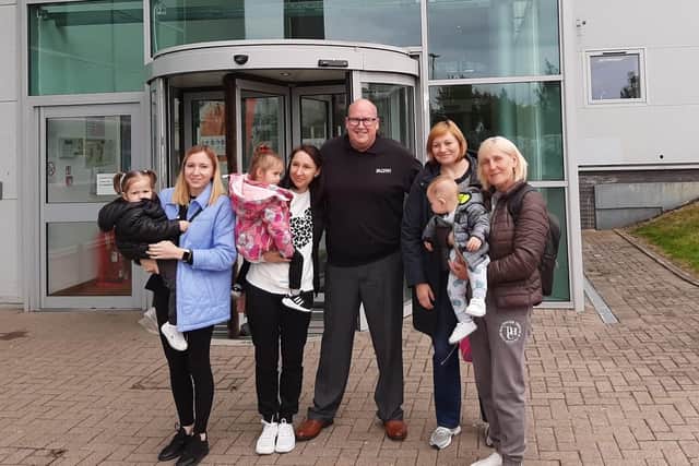 Gary Paterson welcomes Olena Mylokost, Svitlana Gizlarjans, Svetlana Khizhyak and their family to the Fife business