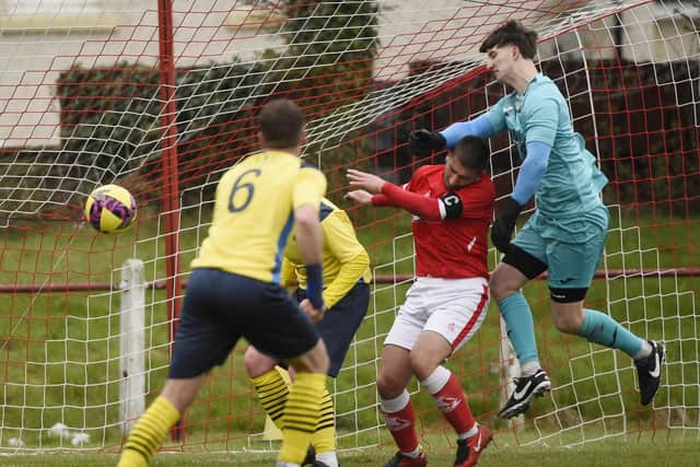 YM keeper Dion Gear under pressure against Camelon