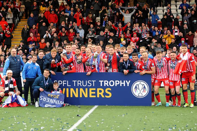 The Raith squad with the SPFL Trust Trophy in front of their fans. (Pic: Fife Photo Agency)