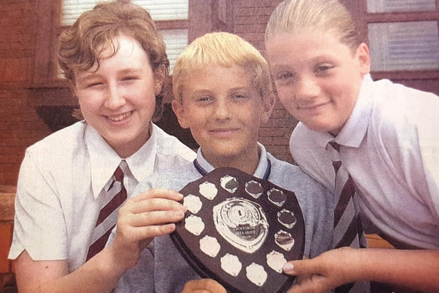 Pupils at Pathhead Primary had the formula for success in 2001. The group were winners of a Kirkcaldy Schools' mathematics quiz. Holding the trophy are (l to r) Emma Kirk, Jack Johnston and Jennifer Chrystal.