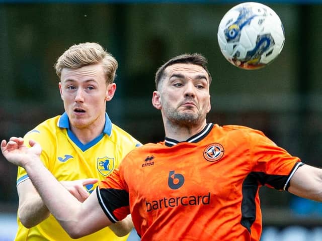 Kyle Turner battles with Dundee United's Tony Watt during Raith Rovers' 2-0 league defeat at Tannadice on March 30 (Pic by Ewan Bootman/SNS Group)