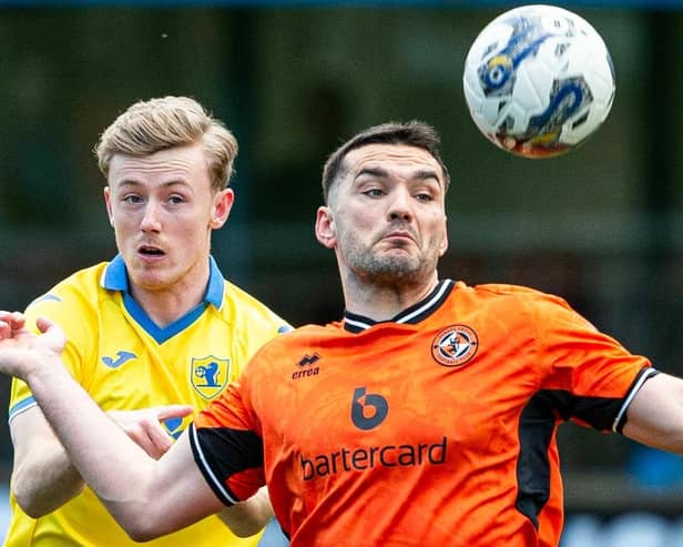Kyle Turner battles with Dundee United's Tony Watt during Raith Rovers' 2-0 league defeat at Tannadice on March 30 (Pic by Ewan Bootman/SNS Group)