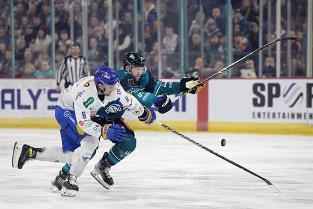 Belfast Giants’ Scott Conway with Fife Flyers’ Christian Hausinger during Wednesday nights Challenge Cup Final at the SSE Arena, Belfast.  Photo by William Cherry/Presseye