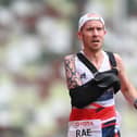 Derek Rae crosses the finish line in the men's Marathon at Tokyo 2020 (Pic: Alex Davidson/Getty Images)