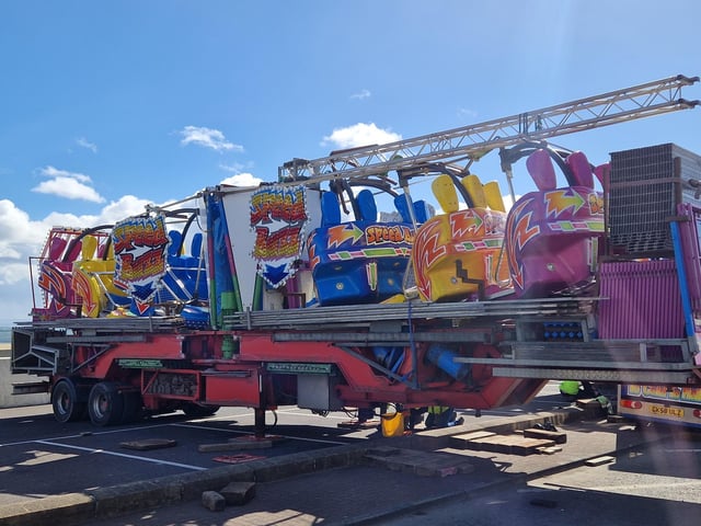 The waltzer carriages all stored, ready for installation