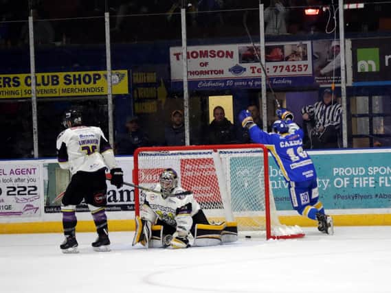 Mike Cazzola celebrates after scoring what proved to the winner against Manchester Storm. Pic: Steve Gunn