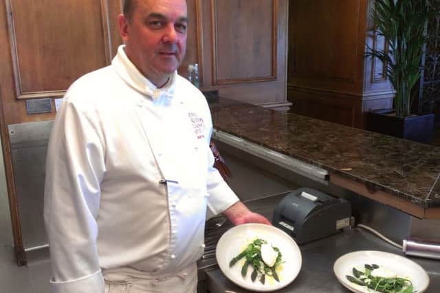 Chef Martin Hollis and his dish of grilled asparagus.