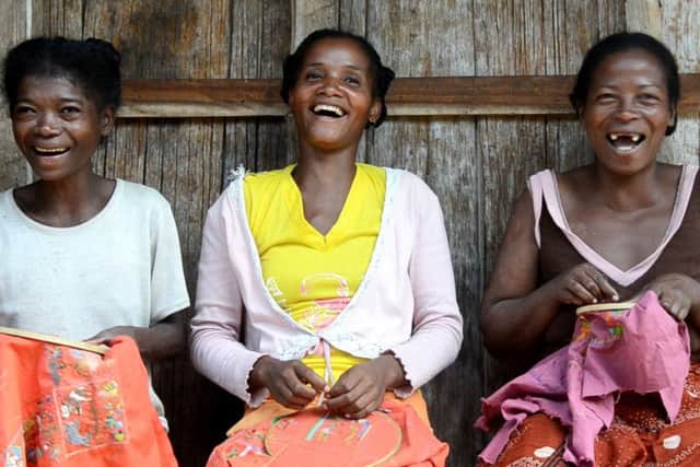 Pictured from left are embroiderers in Madagascar, Kazy Anastasy, Vololonirina Marie Cleire, Rasoamihanta Elyse