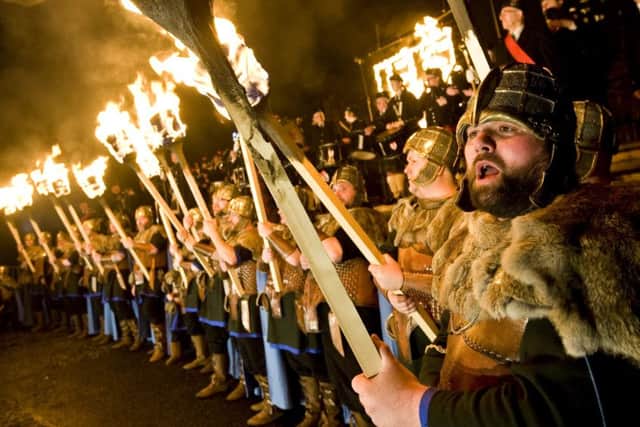 Torchlight processions are traditionally carried out on Hogmanay. Photographer-Ian Georgeson
