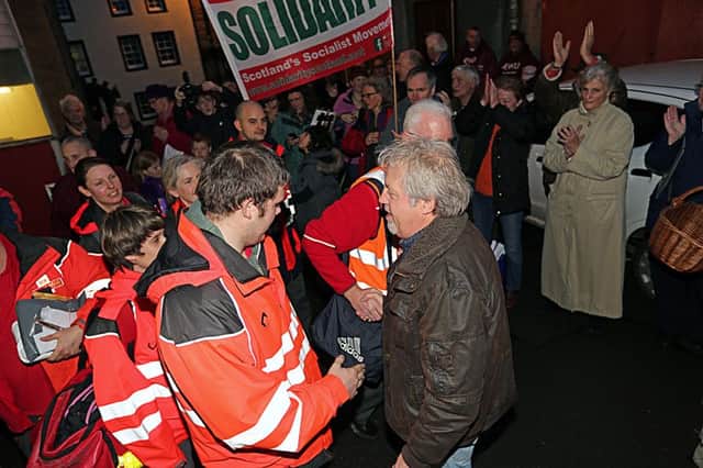 Dave (right) was given huge support from colleagues and customers during the last strike