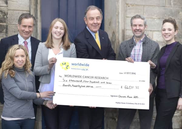 Chariots of Fire committee present cheque to Worldwide Cancer Reserach charity in St Andrews. Pictured: Claire Simpson (Westport Print and Design), Douglas Kinnear (Thorntons Law), Rebecca Drinkwater (Worldwide Cancer Research), Arthur Griffiths (Rotary Club of St Andrews), Colin Brown (Chariots Race Committee), Jamie Craig-Gentles (Eden Brewery).