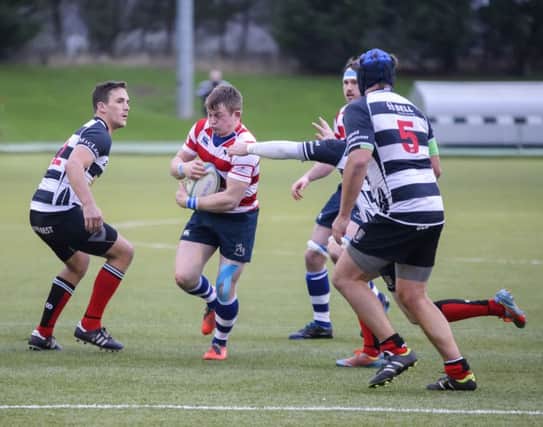 Connor Dow attacks the Kelso defence for the Howe of Fife.
