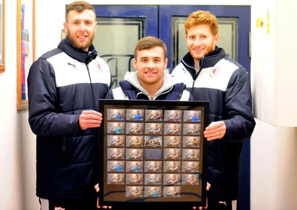 Stark's Park - Kirkcaldy - Fife -  Raith Rovers card collection launched - with Lewis Toshney, Lewis Vaughan & Jason Thomson -   credit - fife photo agency -
