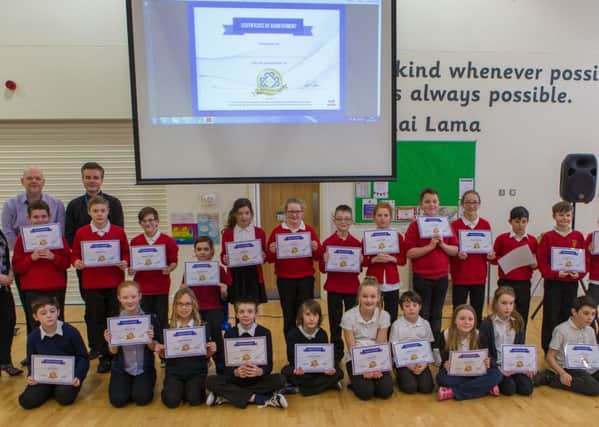 P7 pupils at Burntisland Primary School receive an award for IT.