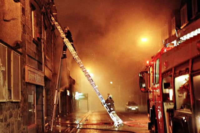 FIREMEN TACKLE THE BLAZE IN FRASERBURGH HIGH STREET IN MAY 1998 WHICH KILLED GORDON GRAHAM.