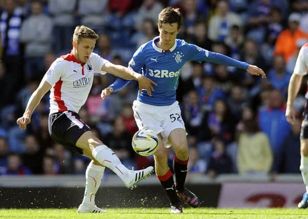Rayn Hardie (right) in action for Rangers against Falkirk at Ibrox last season. Pic: Michael Gillen