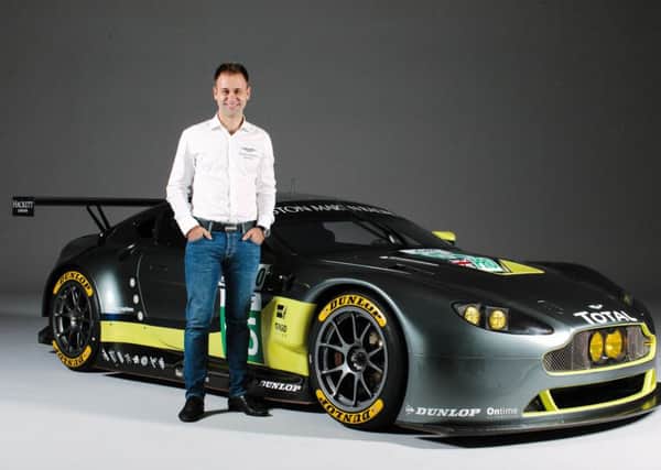 Jonny Adam with the new Aston Martin V8 Vantage he will be racing in the 2016 FIA World Endurance Championship.