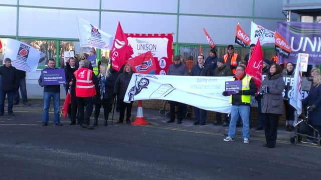 Members of the GMB Union held a protest outside Fife Councils headquarters in Glenrothes this morning (Thursday) over local authority job cuts and staff workloads.