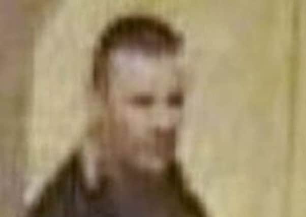 CCTV image of man police in Fife wish to trace in connection with a series of assaults in Dunfermline on February 6.