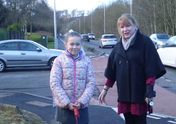 New crossing planned for Oriel Road in summer 2016. Pictured Scarlett Archer with Lana the dog and Councillor Susan Leslie