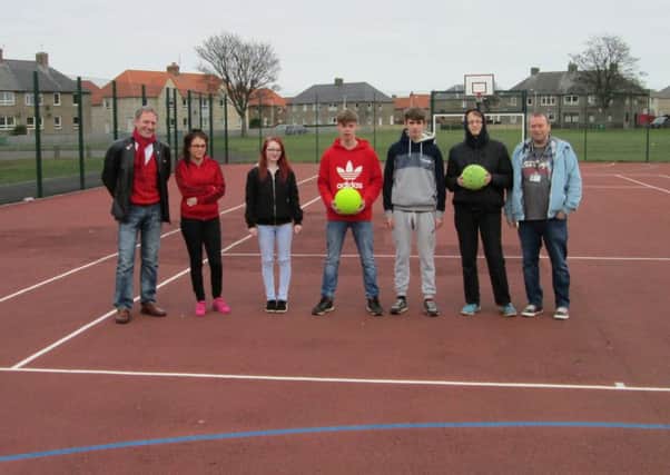 Youngsters at the MUGA (multi use games area) at the Savoy Centre in Methil. They have appealed to dog owners not to use the space.