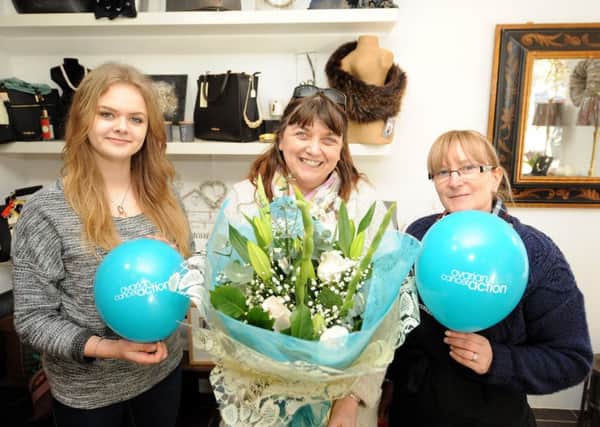 Canterbury Bells are raising money for Ovarian Cancer Action with its 'Bouquet of Hope'  - l to r; Casey McCallum, owner Catherine Young and Elaine Jeans. Pic by Fife Photo Agency