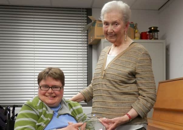 Service user and committee member Susan McGrath (left) with Barbara Linton who recently retired as chairman of Headway Fife.