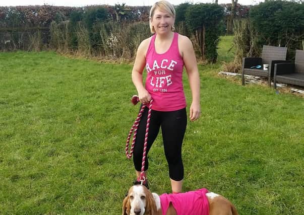 Fiona Clark and her dog Phoebe getting will take part in this year's Race For Life