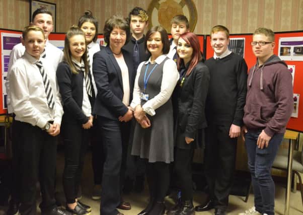 The pupils who worked on the project pictured with teaching staff and Linda Dunion from Apex. Picture by George McLuskie