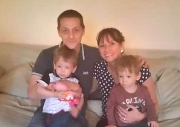 Police are now working with the HSE over the deaths of Rhys and Shaun, pictured with their parents.