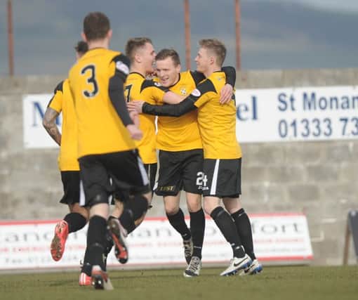 Jamie Insall celebrates after opening the scoring. Pic by G Mcluskie.
