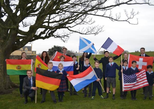 St Leonards Students getting ready for International Day. Mixture of nationalities in the photograph

include: Scottish, English, German, Indian, American, Chinese, Russian, Dutch, Spanish, and African.