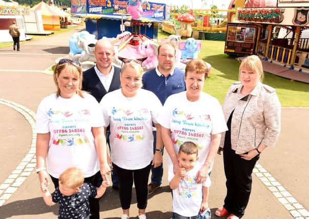 Cllr Susan Leslie with Lang Toun kinship carers and their kids at Burntisland fairground last year. Pic by FPA.